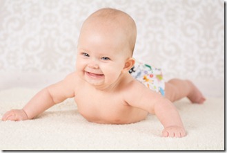 Baby wearing a reusable nappy